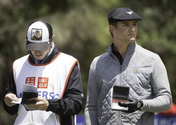 Nov. 21, 2015 - Melbourne, Victoria, Australia - Bryson DeChambeau (AM) of the United States with his caddy on the fourth fairway during day 3 of the 2015 Australian Masters at Huntingdale Golf Club in Melbourne, Australia. Golf 2015 - Australian Masters Day 3 - ZUMAk106