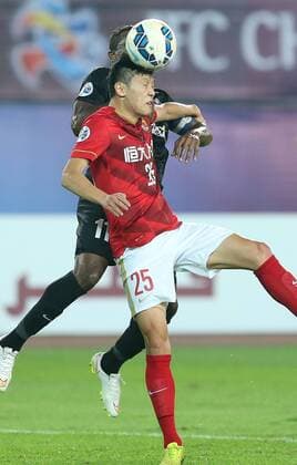 (151121) -- GUANGZHOU, Nov. 21, 2015 -- Zou Zheng (Front) of Guangzhou Evergrande competes during the 2nd round of the AFC Champions League final match between Guangzhou Evergrande and Al Ahli of United Arab Emirates in Guangzhou, China, Nov. 21, 2015. ) (SP)CHINA-GUANGZHOU-SOCCER-AFC CHAMPIONS LEAGUE-FINAL (CN) CaoxCan 