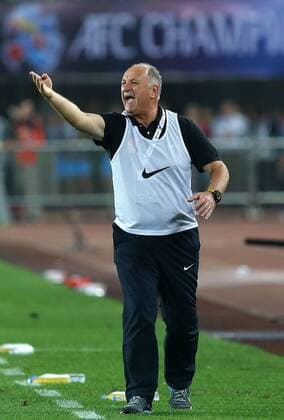 (151121) -- GUANGZHOU, Nov. 21, 2015 -- Luiz Felipe Scolari, head coach of Guangzhou Evergrande, reacts during the 2nd round of the AFC Champions League final match between Guangzhou Evergrande and Al Ahli of United Arab Emirates in Guangzhou, China, Nov. 21, 2015. ) (SP)CHINA-GUANGZHOU-SOCCER-AFC CHAMPIONS LEAGUE-FINAL (CN) CaoxCan 