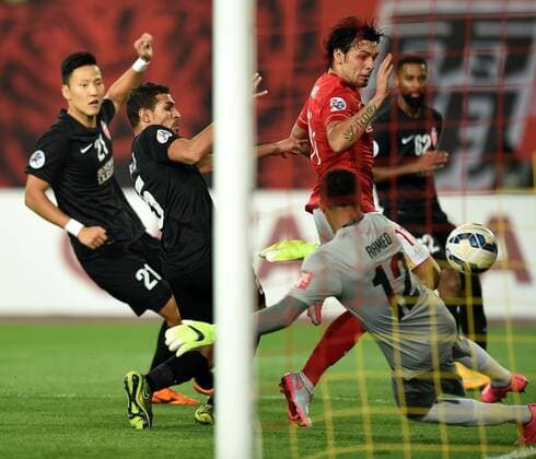 (151121) -- GUANGZHOU, Nov. 21, 2015 -- Goulart (2nd, R) of Guangzhou Evergrande competes during the 2nd round of the AFC Champions League final match between Guangzhou Evergrande and Al Ahli of United Arab Emirates in Guangzhou, China, Nov. 21, 2015. ) (SP)CHINA-GUANGZHOU-SOCCER-AFC CHAMPIONS LEAGUE-FINAL (CN) GuoxYong 