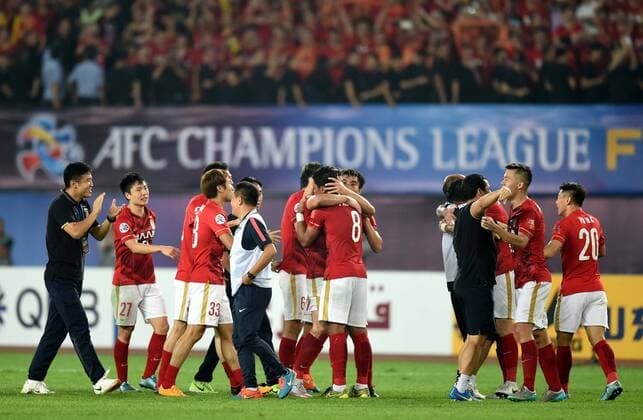 (151121) -- GUANGZHOU, Nov. 21, 2015 -- Players of Guangzhou Evergrande celebrate after winning the 2nd round of the AFC Champions League final match between Guangzhou Evergrande and Al Ahli of United Arab Emirates in Guangzhou, China, Nov. 21, 2015. Guangzhou Evergrande won 1-0 and claimed the title. ) (SP)CHINA-GUANGZHOU-SOCCER-AFC CHAMPIONS LEAGUE-FINAL (CN) GuoxYong 