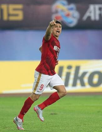 (151121) -- GUANGZHOU, Nov. 21, 2015 -- Elkeson of Guangzhou Evergrande celebrates his goal during the AFC Champions League final match between Guangzhou Evergrande and Al Ahli of United Arab Emirates in Guangzhou, China, Nov. 21, 2015. Guangzhou Evergrande won 1-0 and claimed the title. ) (SP)CHINA-GUANGZHOU-SOCCER-AFC CHAMPIONS LEAGUE-FINAL (CN) CaoxCan 