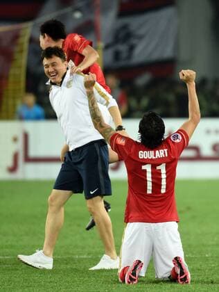 Players of Guangzhou Evergrande celebrate after winning the AFC Champions League final match between Guangzhou Evergrande and Al Ahli of United Arab Emirates in Guangzhou, China, Nov. 21, 2015. Guangzhou Evergrande won 1-0 and claimed the title. ) (SP)CHINA-GUANGZHOU-SOCCER-AFC CHAMPIONS LEAGUE-FINAL (CN) LiuxDawei 
