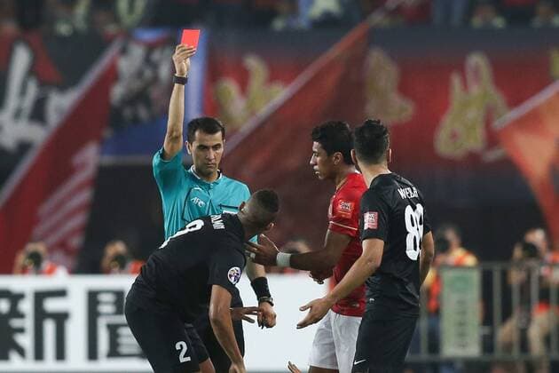 GUANGZHOU, CHINA - NOVEMBER 21: (CHINA OUT) Salmin Khamis Salmin 2 of Al Ahli receives a red card from the referee during the second leg of the AFC Champions League final match between Guangzhou Evergrande and Al Ahli at the Tianhe Sports Center on November 21, 2015 in Guangzhou, China.  CFP476174593 