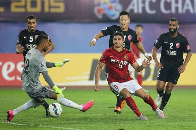 GUANGZHOU, CHINA - NOVEMBER 21: (CHINA OUT) Elkeson 9 of Guangzhou Evergrande scores his team s first goal during the second leg of the AFC Champions League final match between Guangzhou Evergrande and Al Ahli at the Tianhe Sports Center on November 21, 2015 in Guangzhou, China.  CFP476173857 