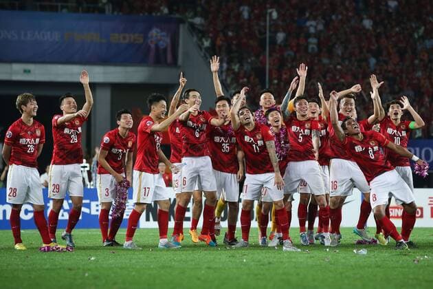 GUANGZHOU, CHINA - NOVEMBER 21: (CHINA OUT) Guangzhou Evergrande players celebrate after winning the second leg of the AFC Champions League final match between Guangzhou Evergrande and Al Ahli at the Tianhe Sports Center on November 21, 2015 in Guangzhou, China.  CFP476176001 