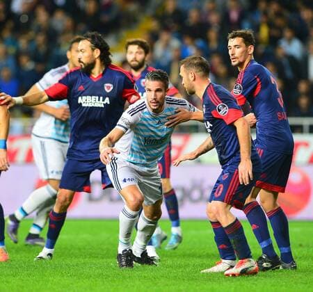Turkey superlig match between Mersin Idman Yurdu and Fenerbahce in Mersin on November 21,2015. Final Score: Mersin Idman Yurdu 1 - Fenerbahce 3 Pictured: Serkan Balci, Loret Sadiku of Mersin Idman Yurdu and Robin van Persie of Fenerbahce.