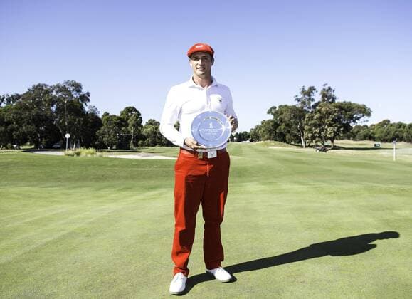 Nov. 22, 2015 - Melbourne, Victoria, Australia - Australian Masters Amateur winner Bryson DeChambeau of the United States poses with his trophy during day 4 2015 Australian Masters at Huntingdale Golf Club in Melbourne, Australia. Golf 2015 - Peter Senior wins the 2015 Australian Masters - ZUMAk106