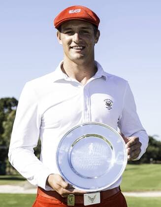 Nov. 22, 2015 - Melbourne, Victoria, Australia - Australian Masters Amateur winner Bryson DeChambeau of the United States poses with his trophy during day 4 2015 Australian Masters at Huntingdale Golf Club in Melbourne, Australia. Golf 2015 - Peter Senior wins the 2015 Australian Masters - ZUMAk106