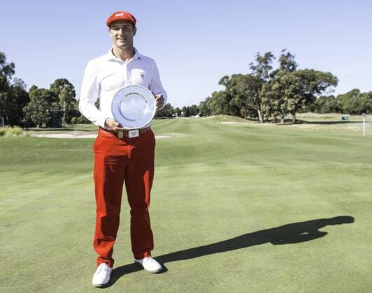 Nov. 22, 2015 - Melbourne, Victoria, Australia - Australian Masters Amateur winner Bryson DeChambeau of the United States poses with his trophy during day 4 2015 Australian Masters at Huntingdale Golf Club in Melbourne, Australia. Golf 2015 - Peter Senior wins the 2015 Australian Masters - ZUMAk106