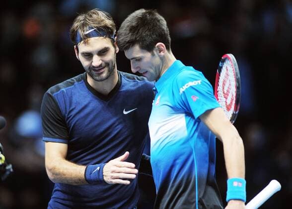 Tennis - 2015 ATP Tennis Herren World Tour Finals at The O2 - Day Seven Singles Final : Novak Djokovic (Srb) v Roger Federer (Sui) Novak Djokovic is congratulated by Roger Federer at the net after the match COLORSPORT ANDREW COWIE 