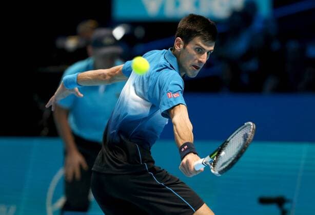 (151123) -- LONDON, Nov. 22, 2015 -- Novak Djokovic of Serbia returns a ball during the men s single s final against Roger Federer of Switzerland at the ATP Tennis Herren World Tour Finals at the O2 Arena in London, Britain, Nov. 22, 2015. Djokovic won 2-0. )? (SP)BRITAIN-LONDON-TENNIS-ATP FINAL-FEDERER VS DJOKOVIC HanxYan 