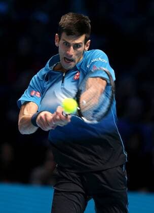 (151123) -- LONDON, Nov. 22, 2015 -- Novak Djokovic of Serbia returns a ball during the men s single s final against Roger Federer of Switzerland at the ATP Tennis Herren World Tour Finals at the O2 Arena in London, Britain, Nov. 22, 2015. Djokovic won 2-0. )? (SP)BRITAIN-LONDON-TENNIS-ATP FINAL-FEDERER VS DJOKOVIC HanxYan 
