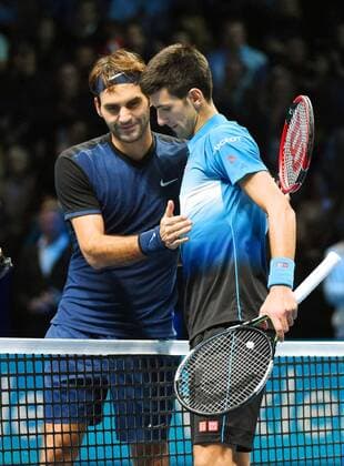 Djokovic wins record 4th consecutive Tour Finals title Roger Federer (L) and Novak Djokovic greet at the net after Djokovic won 6-3, 6-4 in the championship match of the ATP Tennis Herren World Tour Finals in London on Nov. 22, 2015. Djokovic became the first player to win the season-ending tournament four times in a row. 