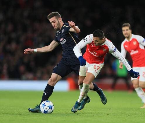 Arsenal s Alexis Sanchez tussles with Dinamo Zagreb s Ivo Pinto UEFA Champions League- Arsenal v Dinamo Zagreb - Emirates Stadium - England - 24th November 2015 - Picture David Klein Sportimage EDITORIAL USE ONLY. No use with unauthorised audio, video, data, fixture lists, club league logos or live services. Online in-match use limited to 120 images, no video emulation. No use in betting, games or single club league player publications.