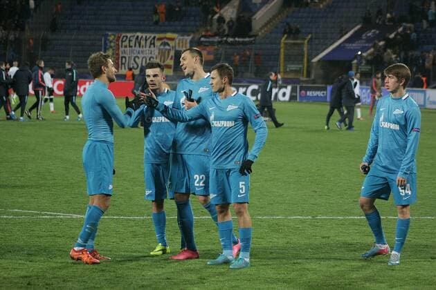 Russian Federation. St. Petersburg. UEFA Champions League, Zenit (Russia) - Valencia (Spain) - 2: 0. Players of FC Zenit Domenico Criscito, Artur Yusupov, Artem Dzyuba Aleksandr Ryazantsev, Alexey Evseev in the UEFA Champions League between the teams, Zenit (Russia, Saint-Petersburg) and Valencia ( Valencia , Valencia, Spain) . MaksimxKonstantinov 