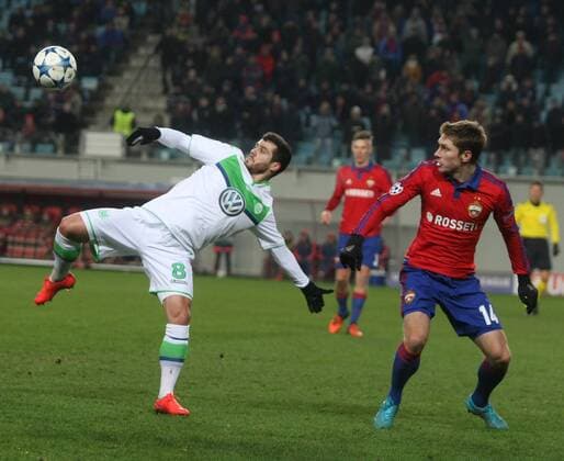 Russia. Moscow region. Khimki. 25 november 2015. Football stadium Arena Khimki . UEFA CHAMPIONS LEAGUE. Playing: Group stage. PFC CSKA Moscow vs VfL Wolfsburg (Germany). 8.Vieirinha (Wolfsburg) vs 14. Nababkin Kirill. 