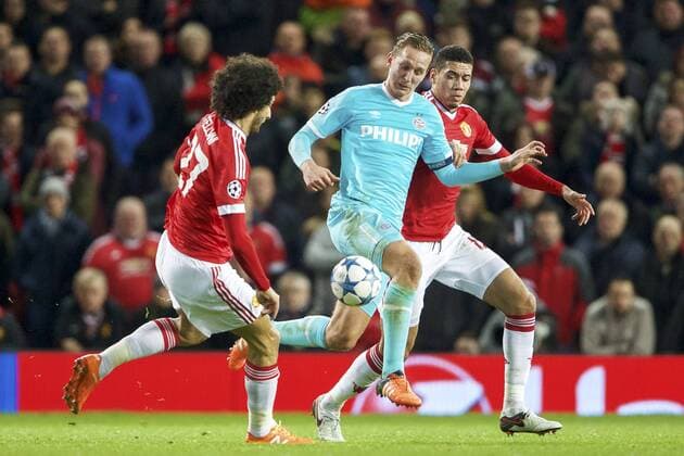 (L-R) Marouane Fellaini of Manchester United ManU Luuk de Jong of PSV, Chris Smalling of Manchester United during the UEFA Champions League group B match between Manchester United and PSV Eindhoven on November 25, 2015 at Old Trafford in Manchester, England Manchester United v PSV Eindhoven Champions Laegue 2015 2016 xVIxxIVx 4625447