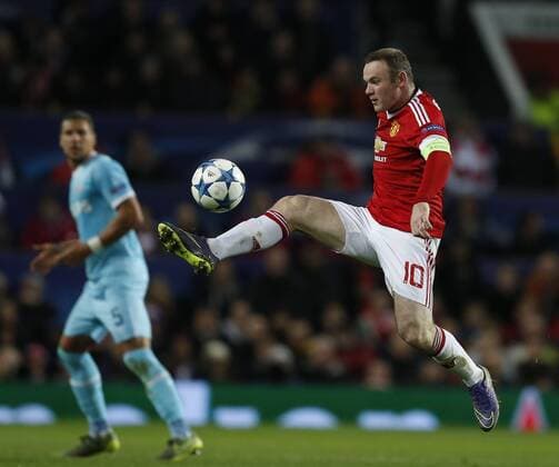 Wayne Rooney of Manchester United ManU leaps up to collect the ball - UEFA Champions League Group B - Manchester Utd vs PSV Eindhoven - Old Trafford Stadium - Manchester - England - 25th November 2015 - Pic Simon Bellis Sportimage EDITORIAL USE ONLY. No use with unauthorised audio, video, data, fixture lists, club league logos or live services. Online in-match use limited to 120 images, no video emulation. No use in betting, games or single club league player publications.
