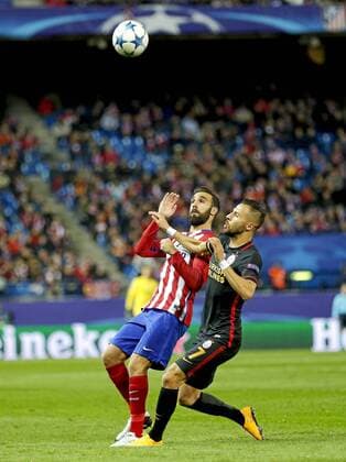 Champions League match played between Atletico Madrid and Galatasaray Istanbul. In this picture, Jesus Gamez and Yasin Oztekin. xANGELxRIVEROx 