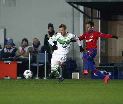 Russia. Moscow region. Khimki. 25 november 2015. Football stadium Arena Khimki . UEFA CHAMPIONS LEAGUE. Playing: Group stage. PFC CSKA Moscow vs VfL Wolfsburg (Germany). 27.Maximilian Arnold (Wolfsburg) vs 7. TOSIC Zoran (CSKA) 