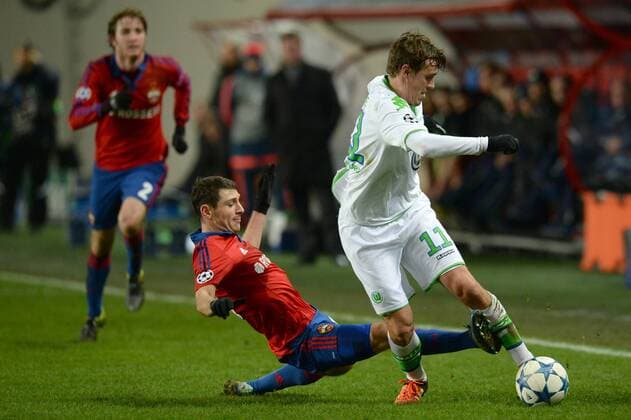 (151126) -- KHIMKI, Nov. 25, 2015 -- Max Kruse of Wolfsburg (R) vies with Alan Dzagoev of CSKA Moscow during the UEFA Champions League group B football match between Russia s CSKA Moscow and Germany s VfL Wolfsburg in Khimki, Russia, Nov. 25, 2015. Wolfsburg won 2-0 ) (SP)RUSSIA-KHIMKI-UEFA CHAMPIONS LEAGUE-CSKA MOSCOW VS WOLFSBURG PavelxBednyakov 