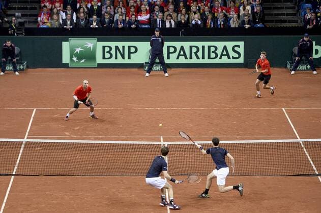 - GENT, BELGIUM: (upper L-R) Belgian Steve Darcis, Belgian David Goffin, (lower L-R) Britain s Andy Murray and Britain s Jamie Murray pictured in action during the third game in the Davis Cup tennis World Group final between Belgium and Great Britain, a doubles game of Belgians David Goffin and Steve Darcis versus Britain s Andy and Jamie Murray, Saturday 28 November 2015 at Flanders Expo in Gent. DIRKxWAEM  x04747915x