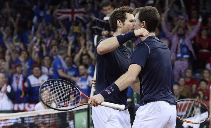 - GENT, BELGIUM: Britain s Andy Murray and Britain s Jamie Murray celebrate after winning the third game in the Davis Cup tennis World Group final between Belgium and Great Britain, a doubles game of Belgians David Goffin and Steve Darcis versus Britain s Andy and Jamie Murray, Saturday 28 November 2015 at Flanders Expo in Gent. DIRKxWAEM  x04748017x