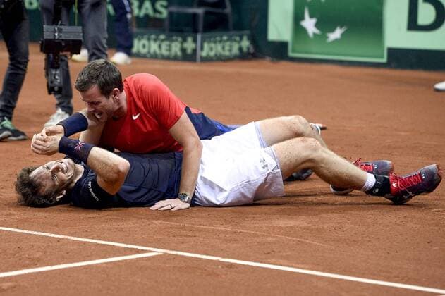 - GENT, BELGIUM: Britain s Andy Murray celebrates on the floor with Britain s captain Leon Smith as he just won his game at the fourth game in the Davis Cup tennis World Group final between Belgium and Great Britain, a game of Belgian David Goffin versus Britain s Andy Murray, Sunday 29 November 2015 at Flanders Expo in Gent. Britain won the final 3 to 1. DIRKxWAEM  x04749109x