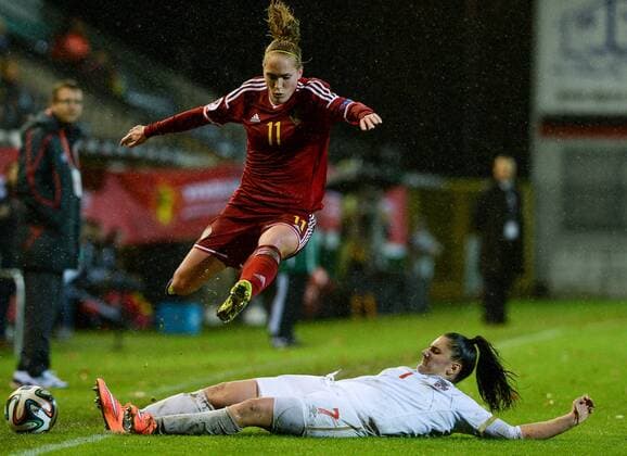 - LEUVEN, BELGIUM: Belgium s Janice Cayman pictured avoiding the tackle from Serbia s Jovana Damnjanovic at a Euro2017 qualification match between the Red Flames Belgian national women soccer team, and Serbia, Monday 30 November 2015 in Leuven. DAVIDxCATRY  x04749886x