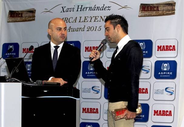 The former FC Barcelona player, Xavi Hernandez, receives the Marca Leyenda award in Doha. In this picture, Bassel Tabbar and Xavi. xFOTOxCHEMAxREYx 