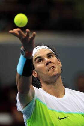(151207) -- PASAY CITY, Dec. 7, 2015 -- Micromax Indian Aces player Rafael Nadal of Spain serves during the men s doubles match against Obi UAE Royals players in the International Premier Tennis League (IPTL) in Pasay City, the Philippines, Dec. 7, 2015. ) (SP)PHILIPPINES-PASAY CITY-TENNIS-IPTL ROUELLExUMALI 