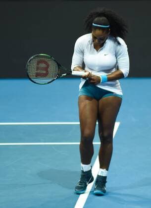 Dec. 7, 2015 - Manila, Philippines - MANILA, Philippines - USAÃ¢â‚¬â ¢s Serena Williams of the Philippine Mavericks wipes her grip during the womenÃ¢â‚¬â ¢s singles match for the International Premiere Tennis League (IPTL) held at the Mall of Asia Arena in Pasay City, south of Manila on 07 December 2015. Widely regarded as the best female player of all time, the American is in the country along with other international tennis superstars for the star-studded premiere league. International Premiere Tennis League in Manila  - ZUMAn230