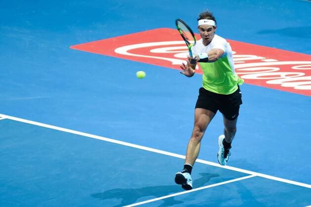 Dec. 7, 2015 - Manila, Philippines - MANILA, Philippines - 14-time Grand Slam singles winner Rafael Nadal in action during the menÃ¢â‚¬â ¢s singles match for the International Premiere Tennis League (IPTL) held at the Mall of Asia Arena in Pasay City, south of Manila on 07 December 2015. The Spanish player is in the country along with other international tennis superstars for the star-studded premiere league. International Premiere Tennis League in Manila  - ZUMAn230