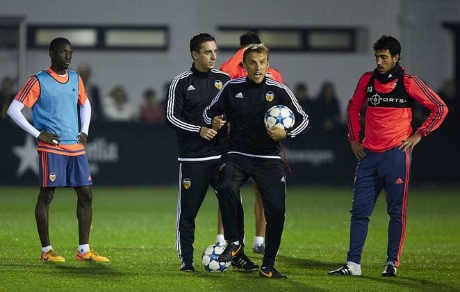 Coach Gary Neville (Valencia) and his brother Assistant Coach Phil Neville and Dani Parejo - UEFA Champions League - pre match Training Session - Valencia CF vs Lyon - Paterna Training Ground - Valencia - Spain - 7th December 2015 - Pic David Aliaga Sportimage EDITORIAL USE ONLY. No use with unauthorised audio, video, data, fixture lists, club league logos or live services. Online in-match use limited to 120 images, no video emulation. No use in betting, games or single club league player publications.