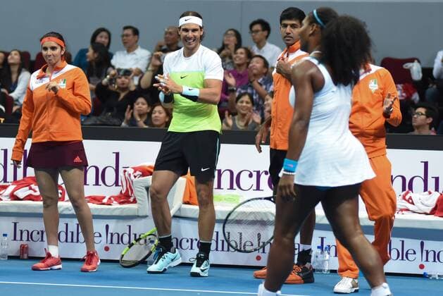 Dec. 8, 2015 - Pasay City, Manila, Philippines - MANILA, PHILIPPINES - DECEMBER 08: SpainÃ¢â‚¬â ¢s Rafael Nadal (2nd from L) along with other tennis stars applaude USAÃ¢â‚¬â ¢s Serena Williams as she wins a match during the International Premiere Tennis League (IPTL) at the Mall of Asia Arena in Pasay City, south of Manila, Philippines on December 08, 2015. International Premiere Tennis League in Manila  - ZUMAn230