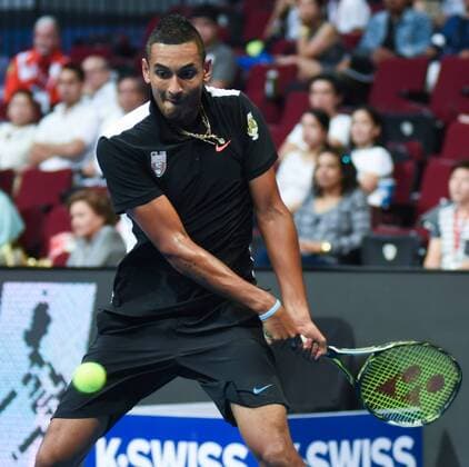 Dec. 8, 2015 - Pasay City, Philippines - MANILA, Philippines - Nick Krygios of the Singapore Slammers returns the ball to his opponent Tomas Berdych of the UAE Royals during the menÃ¢â‚¬â ¢s singles match for the International Premiere Tennis League (IPTL) at the Mall of Asia Arena in Pasay City, south of Manila, Philippines on December 08, 2015. Berdych Vs Krygios  - ZUMAn230