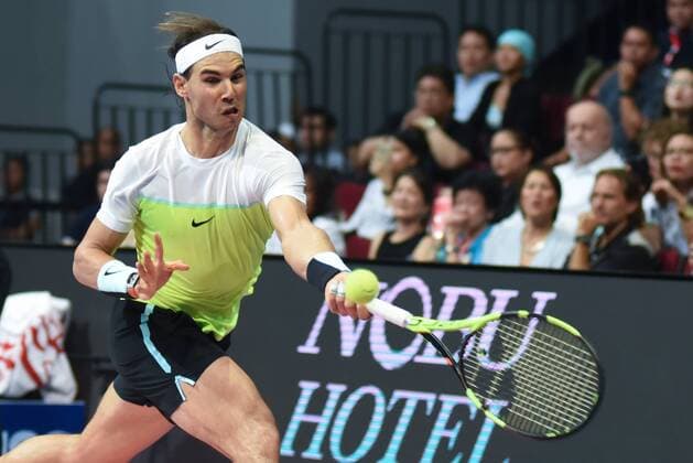 Dec. 8, 2015 - Manila, Philippines - MANILA, Philippines - SpainÃ¢â‚¬â ¢s Rafael Nadal of the Indian Aces touches in action during the menÃ¢â‚¬â ¢s singles match for the International Premiere Tennis League (IPTL) at the Mall of Asia Arena in Pasay City, south of Manila, Philippines on December 08, 2015. International Premiere Tennis League in Manila  - ZUMAn230