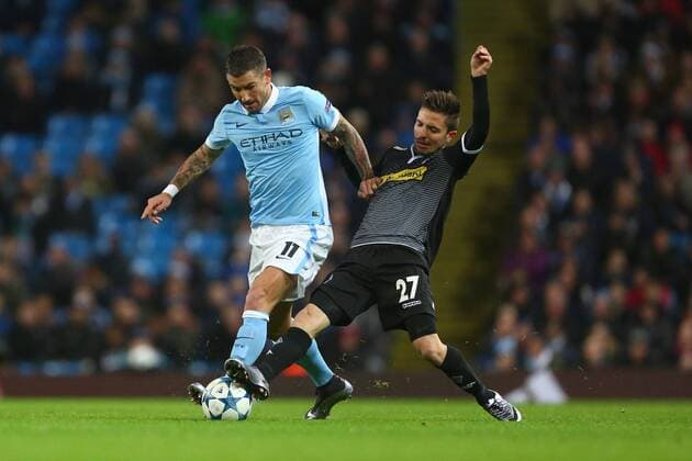 Fußball, Champions League, Manchester City - Borussia Mönchengladbach Aleksander Kolarov of Manchester City battles Julian Korb of Monchengladbach - Manchester City vs Monchengladbach - UEFA Champions League - Etihad Stadium - Manchester - 08 12 2015 Pic Philip Oldham SportImage EDITORIAL USE ONLY. No use with unauthorised audio, video, data, fixture lists, club league logos or live services. Online in-match use limited to 120 images, no video emulation. No use in betting, games or single club league player publications.
