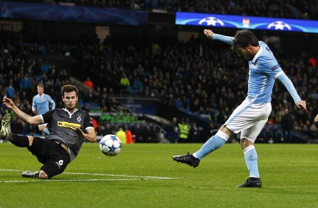 08.12.2015. The Etihad Stadium, Manchester, England. Champions League. Manchester City versus Borussia Monchengladbach. David Silva shoots and scores the first goal for City. xAlanxMartinx  ActionPlus11687203