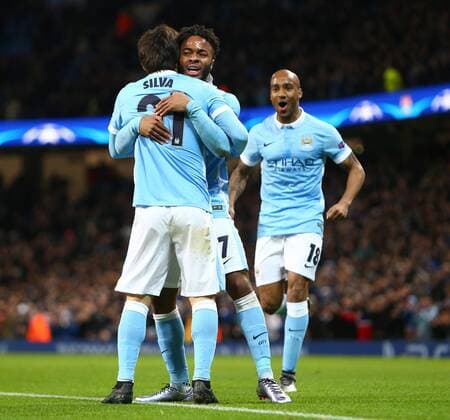Fußball, Champions League, Manchester City - Borussia Mönchengladbach David Silva of Manchester City celebrates his opening goal with Raheem Sterling - Manchester City vs Monchengladbach - UEFA Champions League - Etihad Stadium - Manchester - 08 12 2015 Pic Philip Oldham SportImage EDITORIAL USE ONLY. No use with unauthorised audio, video, data, fixture lists, club league logos or live services. Online in-match use limited to 120 images, no video emulation. No use in betting, games or single club league player publications.