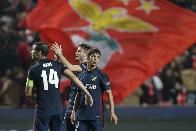 Dec. 8, 2015 - Lisbon, Portugal - Atletico Madrid s midfielder Oliver Torres (R), Atletico Madrid s midfielder Saul (C) and Atletico Madrid s midfielder Gabi (L) celebrate their side s win at the end of the Champions League football match between SL Benfica and Atletico de Madrid at Luz Stadium in Lisbon on December 8, 2015. NURPHOTO CARLOS PALMA. FBL-EUR-C1-BENFICA-ATLETICO  - ZUMAn230