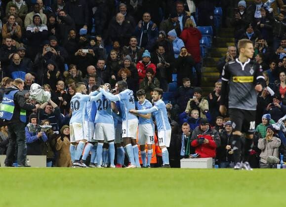 08.12.2015. The Etihad Stadium, Manchester, England. Champions League. Manchester City versus Borussia Monchengladbach. Manchester City s striker Wilfried Bony is congratulated by his team mates after scoring his team s fourth goal. xAlanxMartinx  ActionPlus11687348