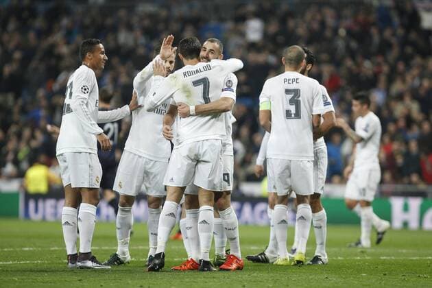 Real Madrid s Karim Benzema celebrates a goal during 2015 16 Champions League soccer match between Real Madrid and Malmo at Santiago Bernabeu stadium in Madrid, Spain. December 08, 2014.  (20151208028)