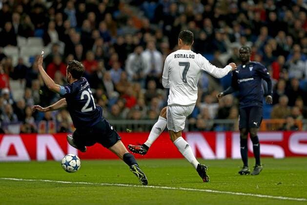 Champions League match between Real Madrid and Malmö FF - In this picture, Cristiano Ronaldo scores one of his four goals. xFOTOxCHEMAxREYx 
