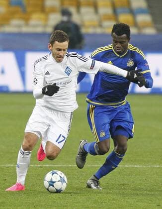 Dec. 9, 2015 - Kiev, Ukraine - SERHIY RYBALKA (L) of Dynamo in action against NOSA IGIEBOR (R) of Maccabi during the UEFA Champions League Group G soccer match between Dynamo Kyiv and FC Maccabi Tel-Aviv,at Olimpiyskyi stadium in Kiev, Ukraine, 09 December 2015. Soccer 2015 - DYNAMO vc MACCABI,UEFA Champions League Group G - ZUMAg194