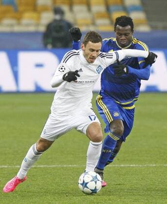 Dec. 9, 2015 - Kiev, Ukraine - Serhiy Rybalka (L) of Dynamo in action against Nosa Igiebor (R) of Maccabi during the UEFA Champions League Group G soccer match between Dynamo Kyiv and FC Maccabi Tel-Aviv,at Olimpiyskyi stadium in Kiev, Ukraine, 09 December 2015. FC Dynamo Kyiv vc Maccabi Tel-Aviv - UEFA Champions League  - ZUMAn230