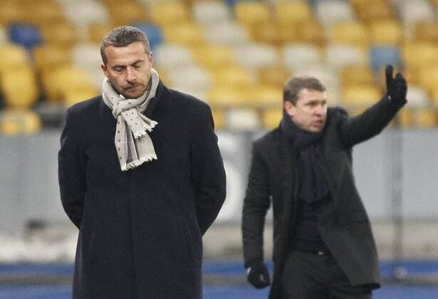 Fußball, Champions League, Dynamo Kiew - Maccabi Tel Aviv Dec. 9, 2015 - Kiev, Ukraine - FC Maccabi Tel-Aviv s head coach SLAVISA JOKANOVIC (L) and FC Dynamo Kiev s coach SERHIY REBROV (R) react during the UEFA Champions League Group G soccer match between Dynamo Kyiv and FC Maccabi Tel-Aviv,at Olimpiyskyi stadium in Kiev, Ukraine, 09 December 2015. Soccer 2015 - DYNAMO vc MACCABI,UEFA Champions League Group G - ZUMAg194