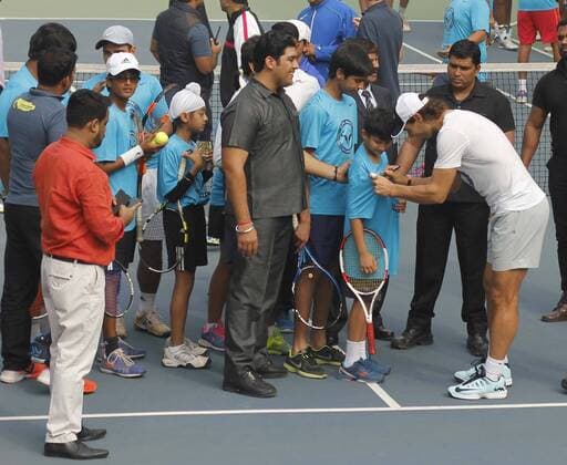 NEW DELHI, INDIA - DECEMBER 10: Rafael Nadal, Spanish Tennis player during the inaugural match for a tie-up between Rafael Nadal Academy and Mahesh Bhupathi Tennis Academies (MBTA) to identify talents in India and offer them the opportunity to receive expert coaching, at R.K. Khanna Tennis Complex , RK Puram, on December 10, 2015 in New Delhi, India. (Photo by Sanchit Khanna Hindustan Times ) Rafael Nadal And Mahesh Bhupathi Tennis Academies Tie Up For Collaboration