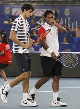 NEW DELHI, INDIA - DECEMBER 10: Leander Paes and Herbert of Legendary Japanese warriors in action against Berdych and Nestor of Obi UAE Royals during the Coca Cola International Premier Tennis League at IG stadium, on December 10, 2015 in New Delhi, India. Legendary Japan Warriors won their first match of the International Premier Tennis League (IPTL) with a 24-21 margin against OBI UAE Royals. (Photo by Virendra Singh Gosain Hindustan Times ) Coca Cola International Premier Tennis League